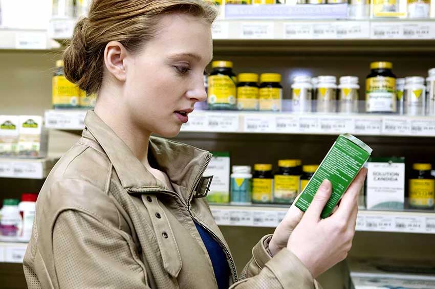 Woman Reading Label